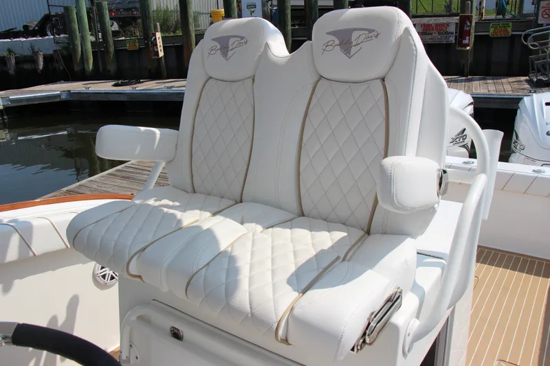 Slide: The Image of Luxurious seating on a 2019 Buddy Davis 34 Center Console boat, featuring diamond-stitched upholstery. - 34