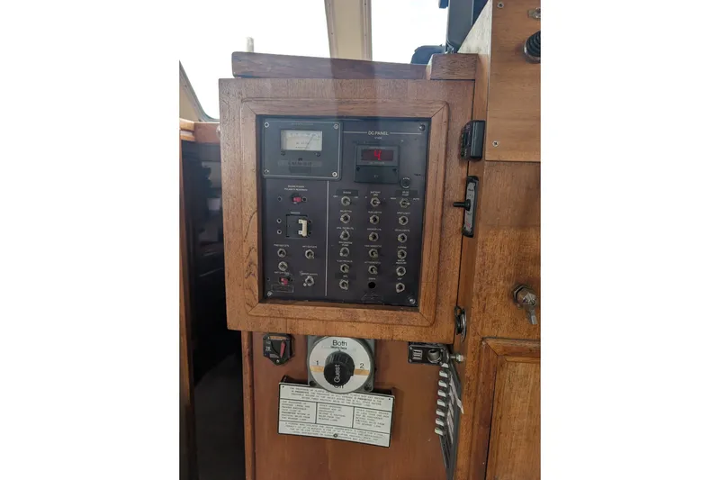 Slide: The Image of Control panel of a 1979 SUNYONG PS Trawler with switches and gauges. - 38