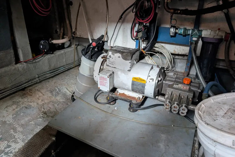 Slide: The Image of Engine room of a 1979 SUNYONG PS Trawler with mechanical equipment and wiring. - 56