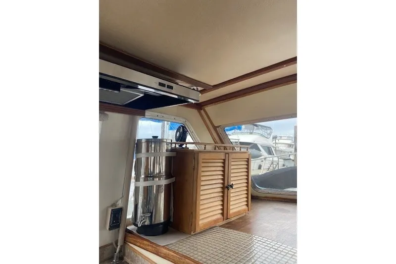Slide: The Image of Interior of 1979 SUNYONG PS Trawler with wooden cabinet and stainless steel appliance. - 27