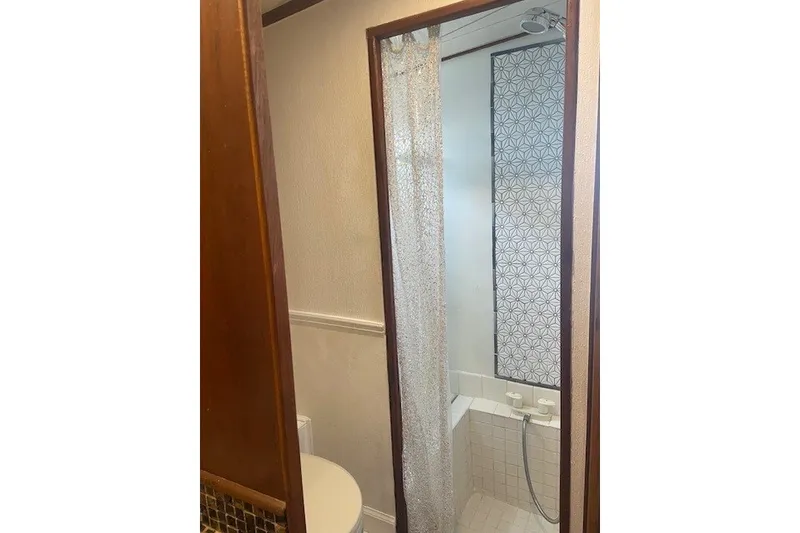 Slide: The Image of Bathroom interior of 1979 SUNYONG PS Trawler with shower and patterned tiles. - 46