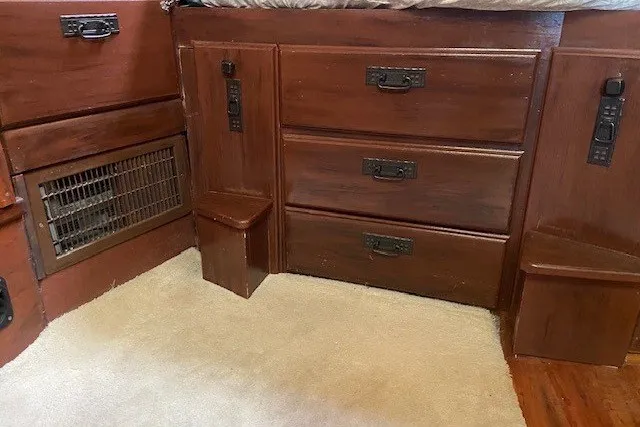 Slide: The Image of Wooden interior of 1979 SUNYONG PS Trawler with drawers and vent on carpeted floor. - 41