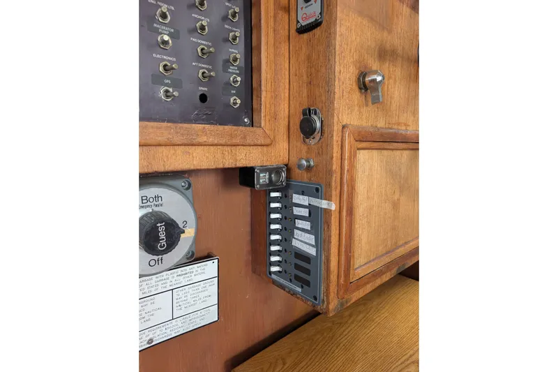Slide: The Image of Electrical panel and controls on a 1979 SUNYONG PS Trawler boat interior. - 37