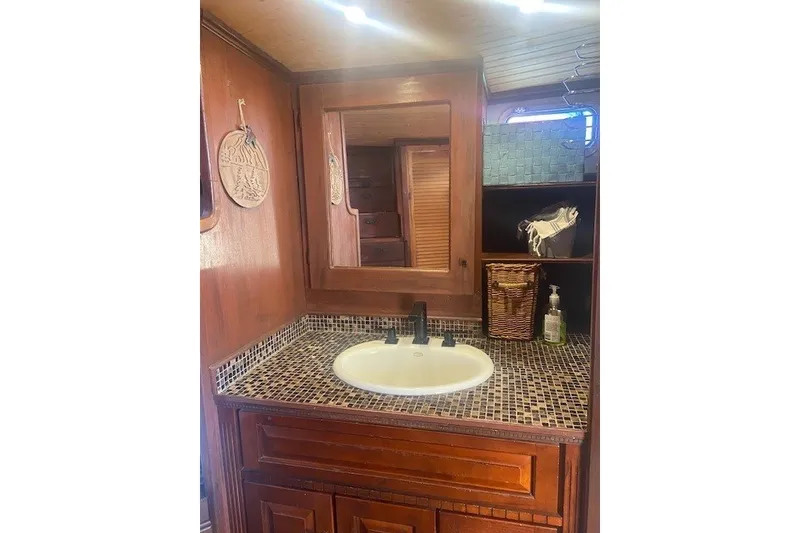 Slide: The Image of Wooden bathroom interior of 1979 SUNYONG PS Trawler with sink and mirror. - 42