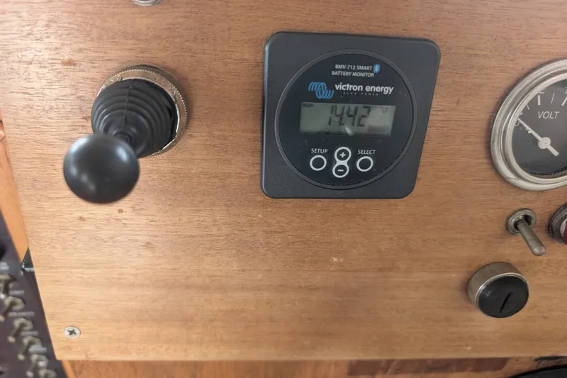 Slide: The Image of Control panel of a 1979 SUNYONG PS Trawler with Victron Energy battery monitor. - 33