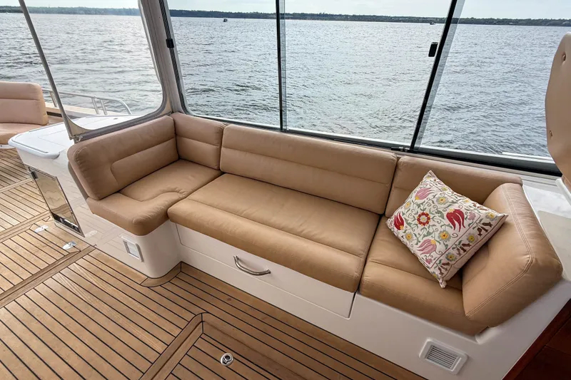 Slide: The Image of Luxurious seating area on 2017 MJM 50z yacht with scenic water view. - 15