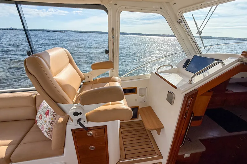 Slide: The Image of Luxurious interior of 2017 MJM 50z yacht with leather seating and scenic ocean view. - 17