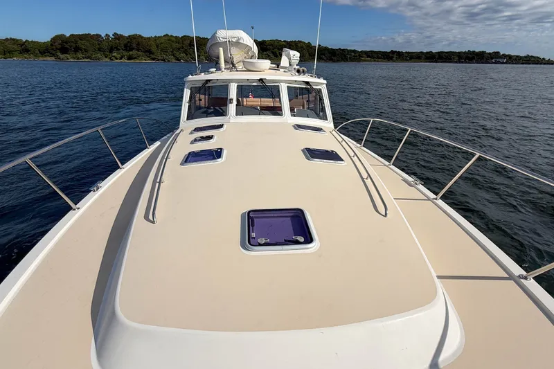 Slide: The Image of 2017 MJM 50z yacht cruising on open water with clear sky. - 53
