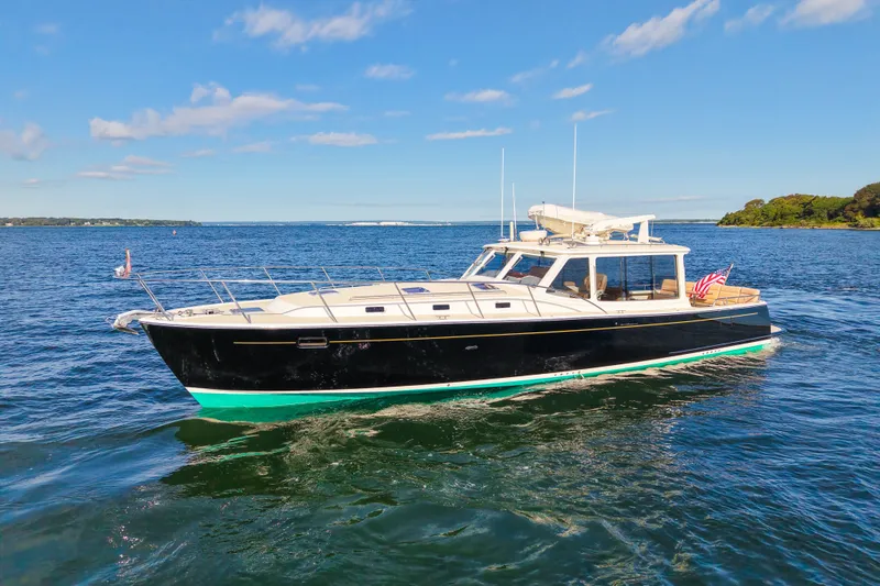 The Image of 2017 MJM 50z yacht cruising on a sunny day with clear blue skies. - 0