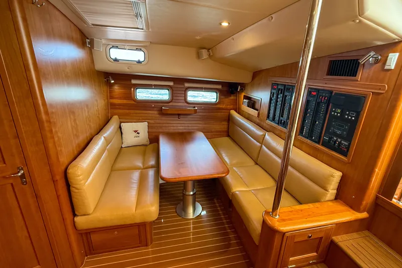 Slide: The Image of Luxurious 2017 MJM 50z yacht interior with leather seating and wooden finishes. - 29