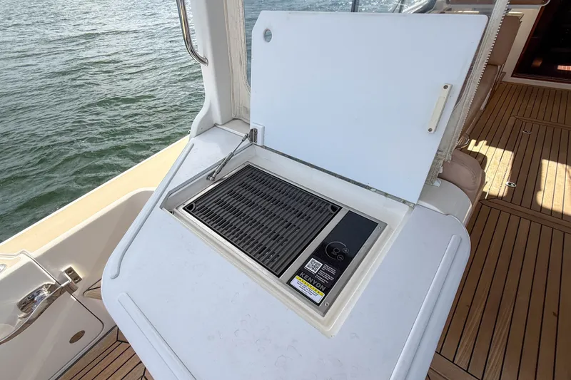 Slide: The Image of Outdoor grill on 2017 MJM 50z yacht deck, overlooking water. - 13