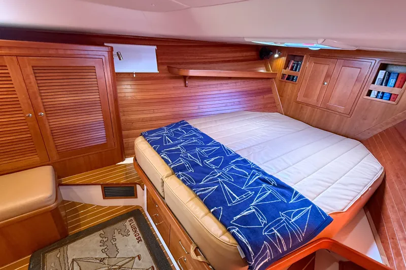 Slide: The Image of Luxurious cabin interior of 2017 MJM 50z yacht with cozy bed and wooden finish. - 41