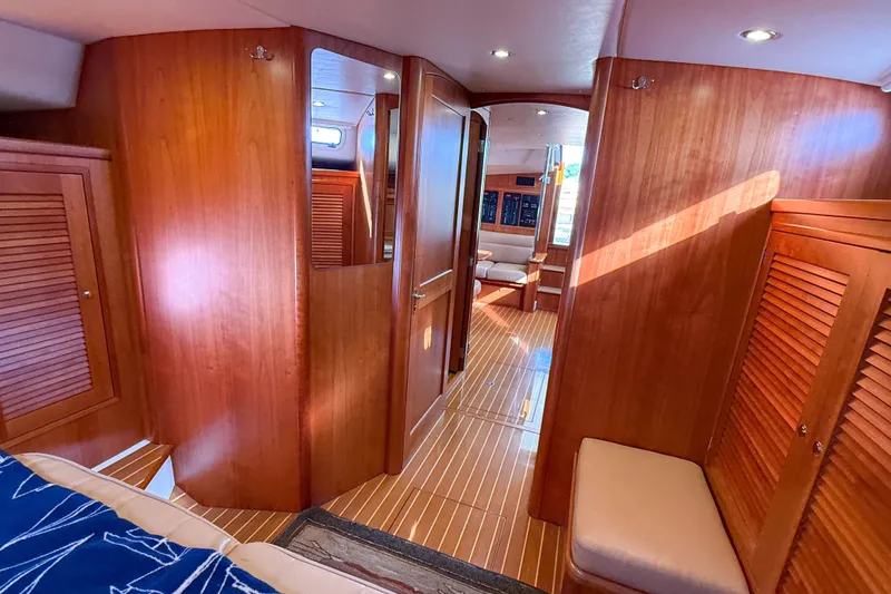 Slide: The Image of Luxurious interior of 2017 MJM 50z yacht with wooden finishes and seating area. - 43
