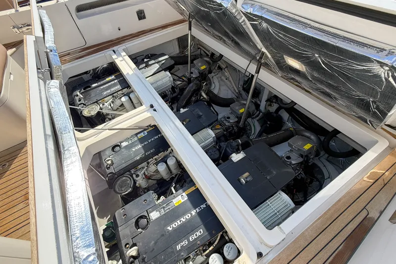 Slide: The Image of Engine compartment of a 2017 MJM 50z boat with Volvo Penta IPS 600 engines. - 60