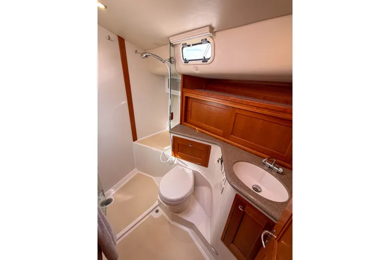 Slide: The Image of Luxurious bathroom in 2017 MJM 50z yacht with wood cabinetry and modern fixtures. - 45