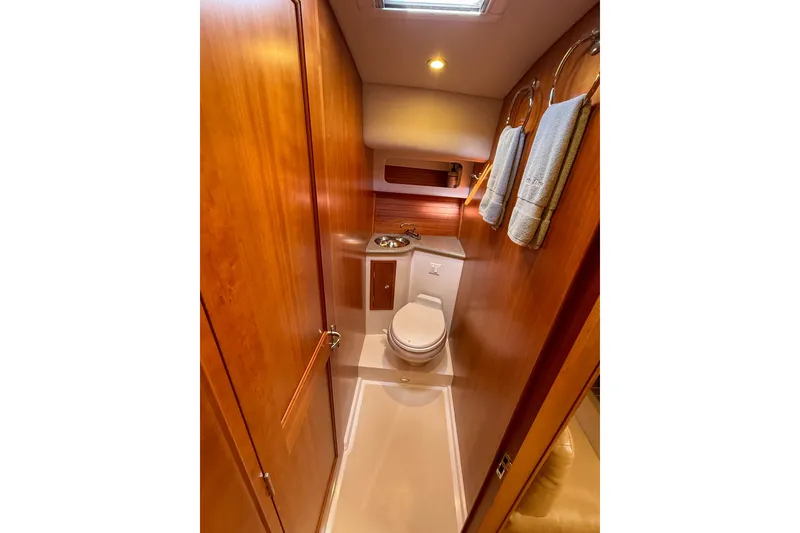 Slide: The Image of Luxurious 2017 MJM 50z yacht bathroom with wood finish and modern amenities. - 38