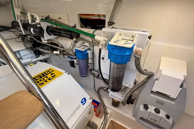 Slide: The Image of Engine room of 2017 MJM 50z yacht with filtration systems and equipment. - 59