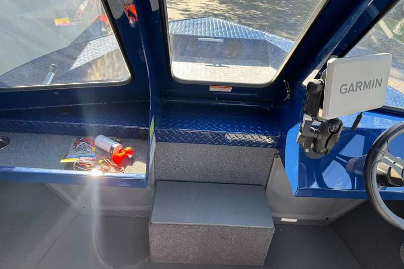 Slide: The Image of Interior of 2025 Duckworth 20 Advantage boat with Garmin navigation system. - 18