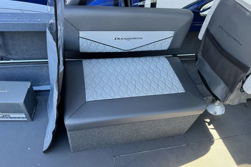 Slide: The Image of 2025 Duckworth 20 Advantage boat interior with gray diamond-stitched seating and branded upholstery. - 15