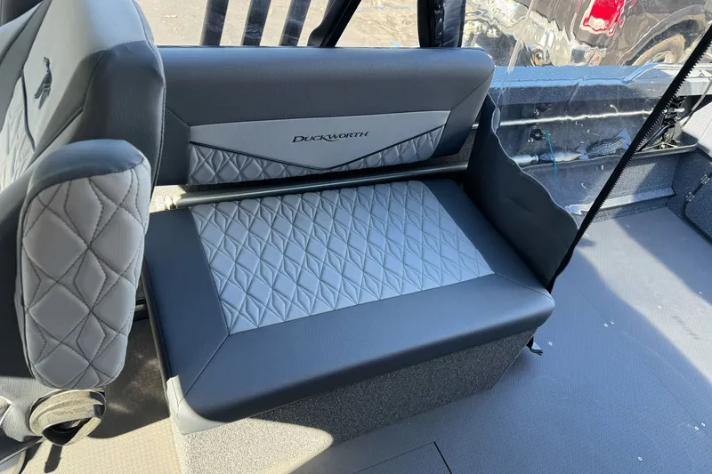 Slide: The Image of Interior seating of 2025 Duckworth 20 Advantage boat with quilted upholstery. - 21