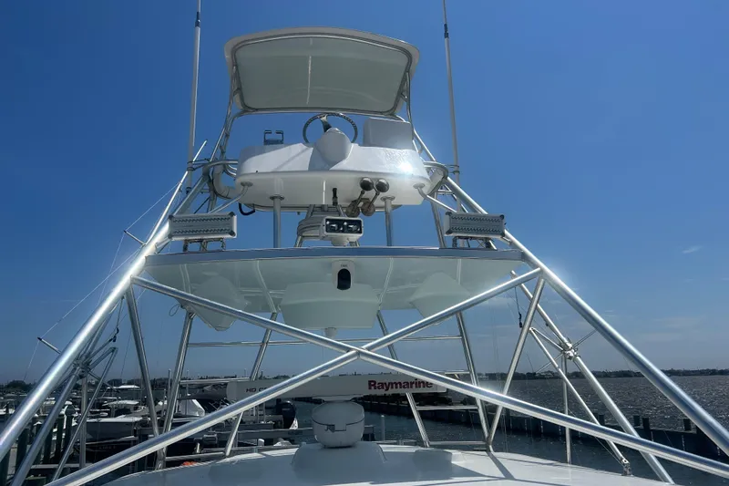Slide: The Image of 2006 Topaz 40 Express boat tower with clear blue sky background. - 24