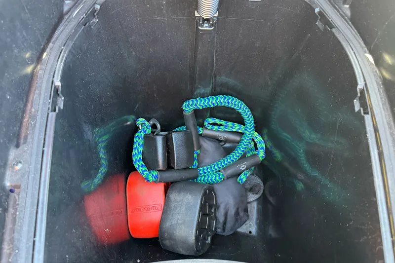 Slide: The Image of Storage compartment of 2021 Sea-Doo RXT-X 300 with accessories and equipment. - 13