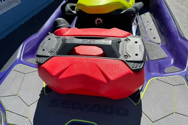 Slide: The Image of 2021 Sea-Doo RXT-X 300 with red fuel container on deck, showcasing vibrant design. - 15