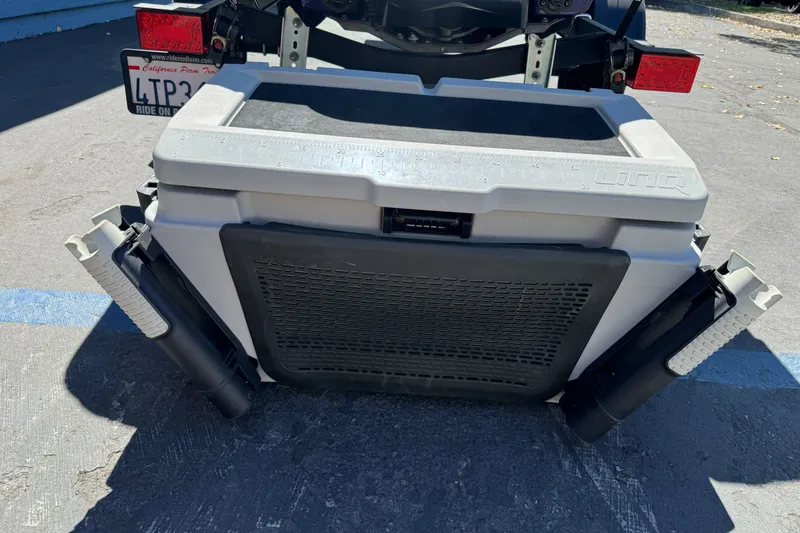 Slide: The Image of Rear view of a 2021 Sea-Doo RXT-X 300 with attached storage box. - 17