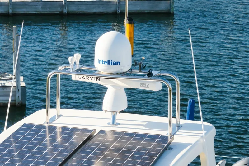 Slide: The Image of 2015 North Pacific NP49 yacht with solar panels and Intellian satellite system. - 57