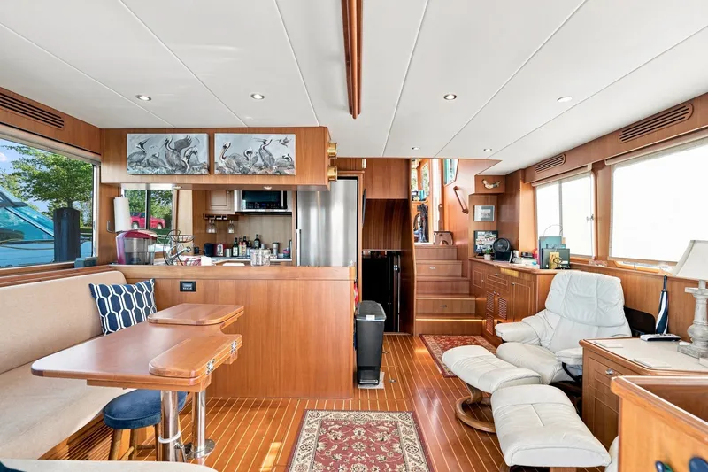 Slide: The Image of Luxurious 2015 North Pacific NP49 yacht interior with wood finishes and modern amenities. - 5