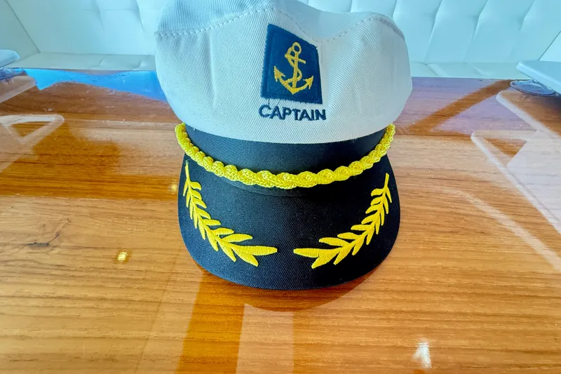 Slide: The Image of Captain's hat with anchor emblem on Tiara Yachts C44 Coupe, 2015 model. - 31