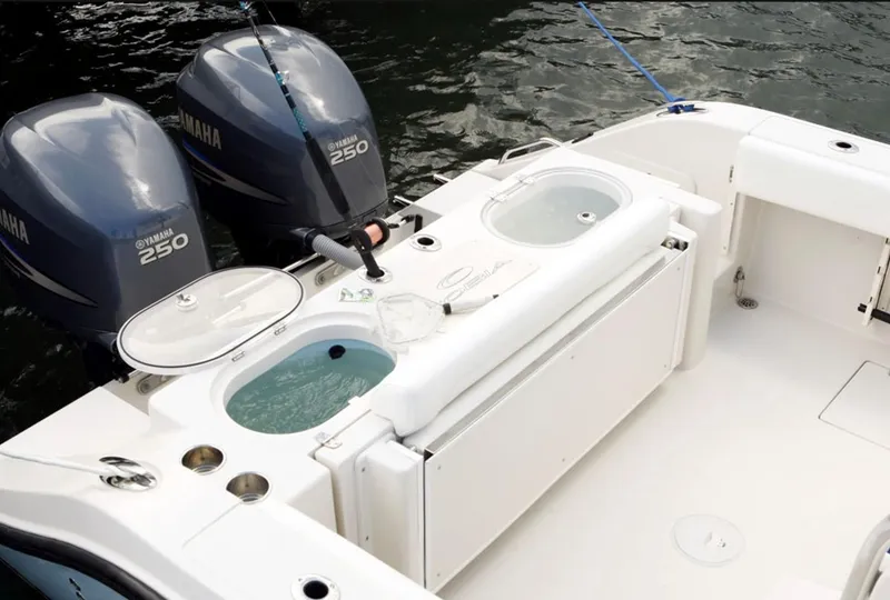 Slide: The Image of Manufacturer Provided Image: 2015 Cobia 296 Center Console boat with twin Yamaha 250 engines. - 32