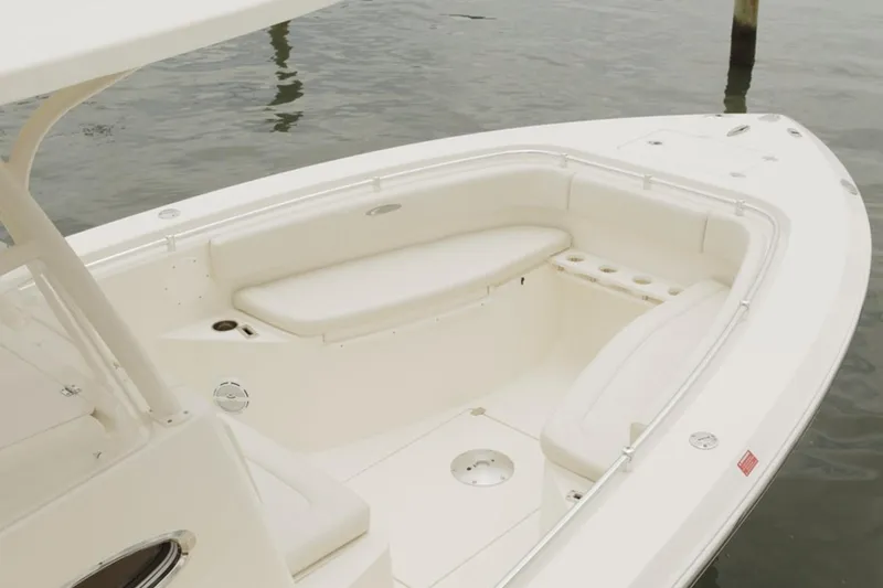 Slide: The Image of Manufacturer Provided Image: 2015 Cobia 296 Center Console boat with spacious seating area. - 28