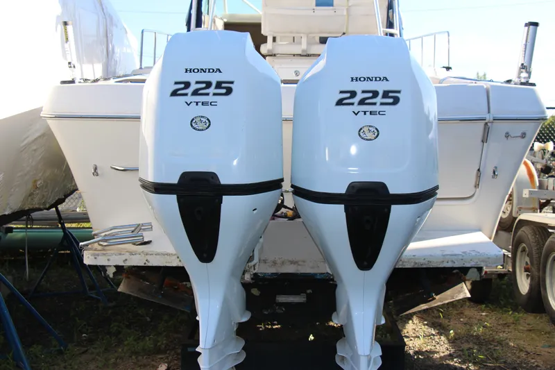 Slide: The Image of 1996 Pro-Line 2950 Walkaround with dual Honda 225 VTEC outboard engines. - 16