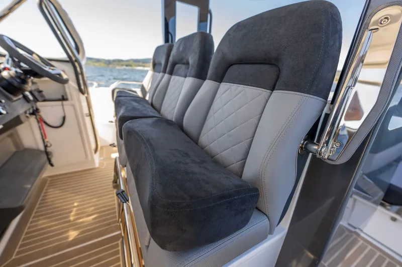 Slide: The Image of Luxurious seating on 2023 Nimbus Tender 11 boat, featuring modern design and comfort. - 4