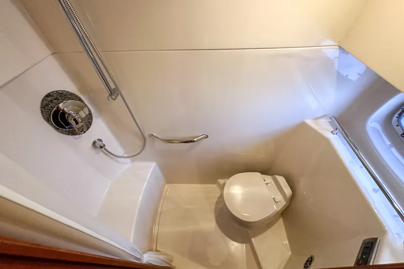 Slide: The Image of Bathroom interior of 2006 Sea Ray 48 Sundancer yacht with shower and toilet. - 78