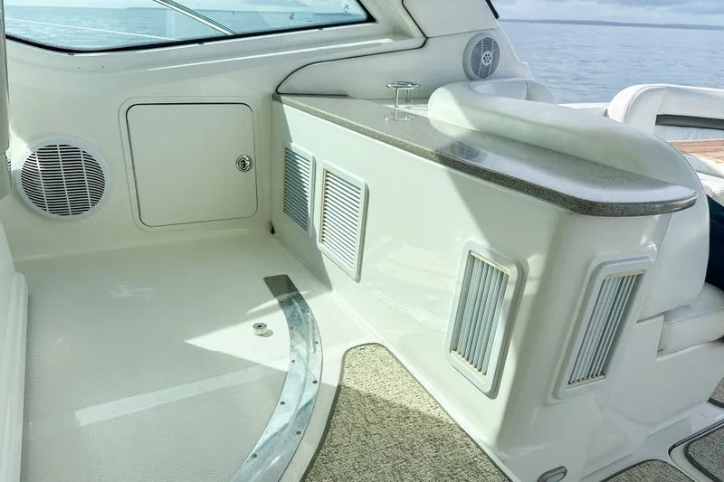 Slide: The Image of Interior view of a 2006 Sea Ray 48 Sundancer yacht, featuring sleek design and modern amenities. - 56