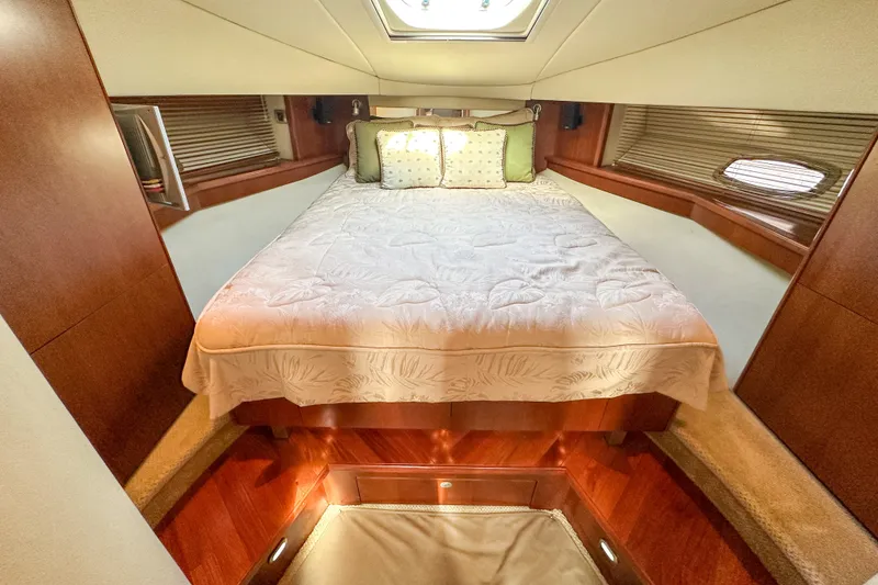 Slide: The Image of Luxurious cabin interior of 2006 Sea Ray 48 Sundancer yacht with elegant bedding. - 69