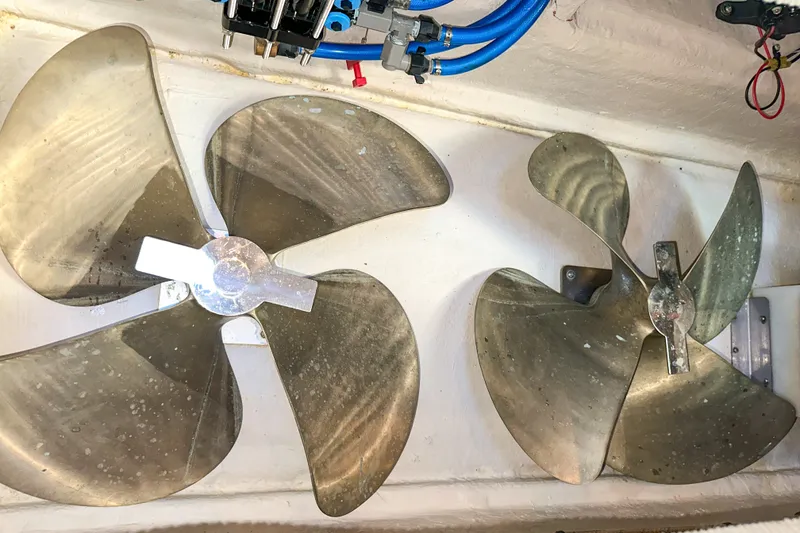 Slide: The Image of Propellers of a 2006 Sea Ray 48 Sundancer boat, showcasing marine engineering. - 80