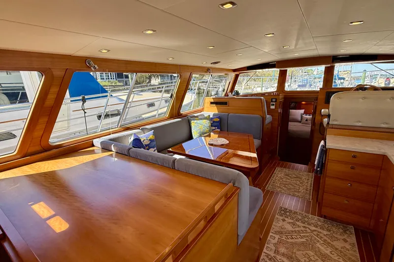 Slide: The Image of Luxurious interior of 2015 Coastal Craft 45 yacht with elegant wood finishes and plush seating. - 44