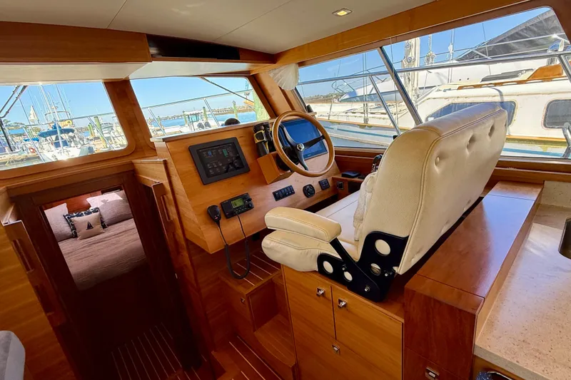Slide: The Image of Interior of 2015 Coastal Craft 45 yacht with helm station and cabin view. - 48