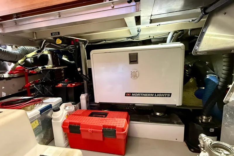 Slide: The Image of Engine room of 2015 Coastal Craft 45 with Northern Lights generator and tools. - 79