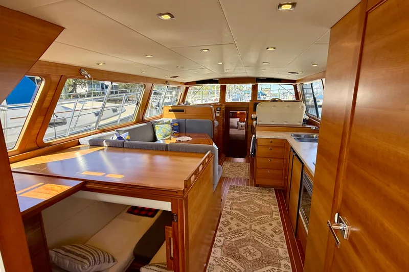 Slide: The Image of Luxurious interior of 2015 Coastal Craft 45 yacht with wood finishes and modern amenities. - 42