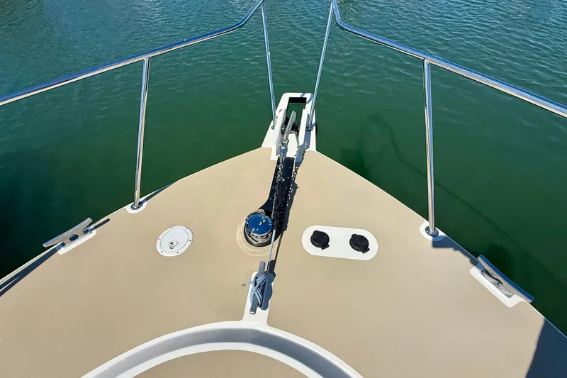 Slide: The Image of Bow view of 2015 Coastal Craft 45 yacht with anchor and railing. - 22