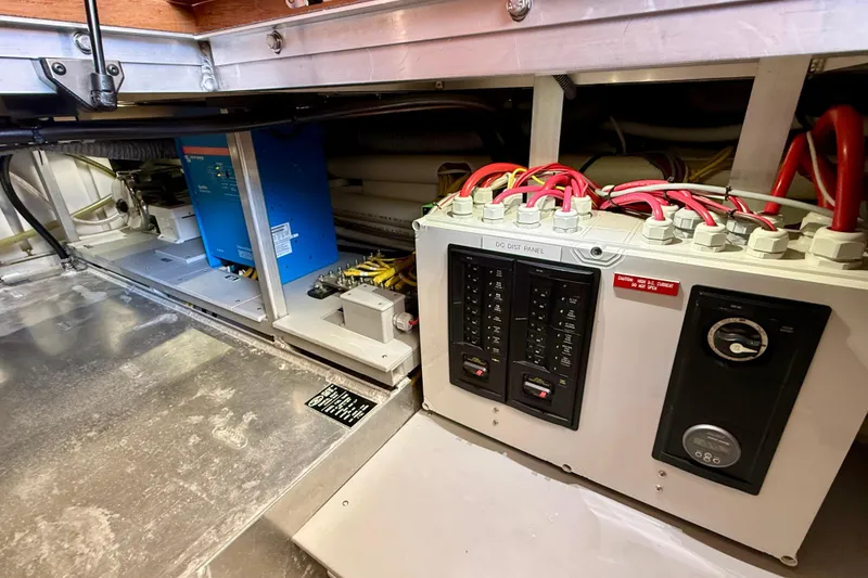Slide: The Image of Electrical panel and components inside a 2015 Coastal Craft 45 yacht. - 85