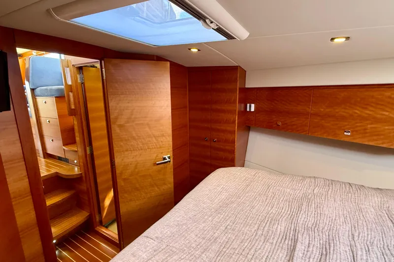 Slide: The Image of Luxurious interior of 2015 Coastal Craft 45 yacht with wood finish and skylight. - 63