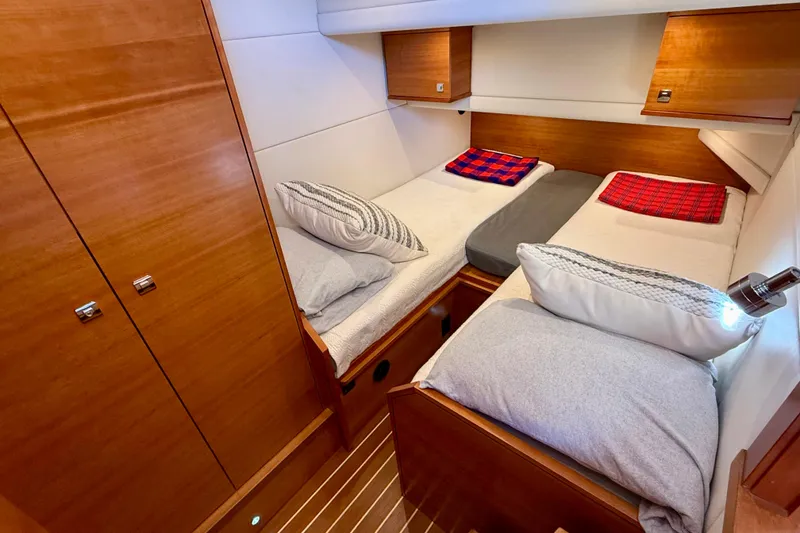 Slide: The Image of Luxurious twin cabin interior of 2015 Coastal Craft 45 yacht with wooden finishes. - 67