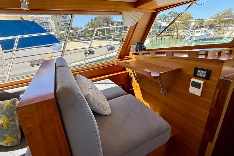 Slide: The Image of Interior of 2015 Coastal Craft 45 yacht with wooden finish and comfortable seating. - 53