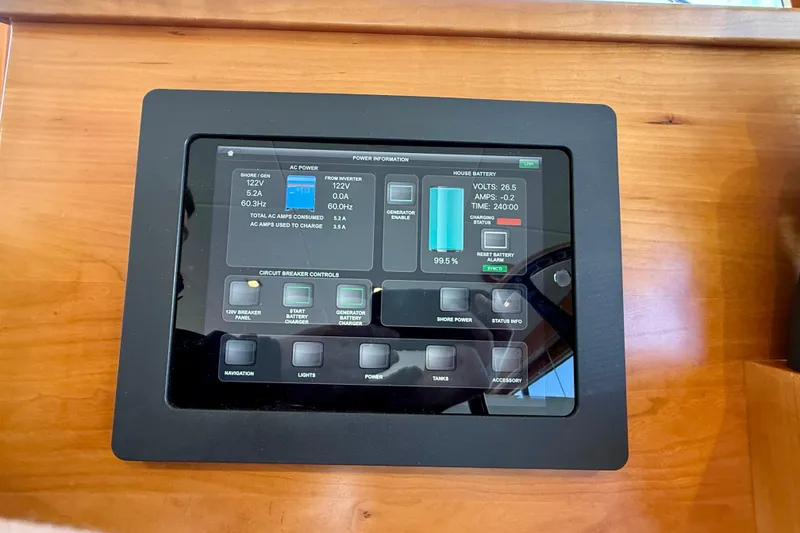Slide: The Image of Control panel display on a 2015 Coastal Craft 45 yacht, showing power and battery information. - 51