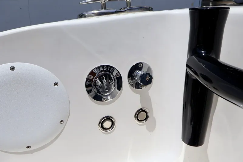 Slide: The Image of Close-up of 2023 Fountain 34 Tournament Edition boat waste and water fittings. - 20